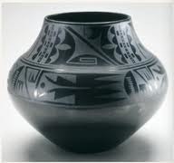 Black-on-black ceramic vessel Maria Martinez and Julian Martinez, Tewa, Puebloan, San Ildefonso Pueblo, New Mexico. c. mid-20th century C.E. Blackware ceramic They discovered that smothering the fire with powdered manure removed the oxygen while retaining the heat and resulted in a pot that was blackened. This resulted in a pot that was less hard and not entirely watertight, which worked for the new market that prized decorative use over utilitarian value. The areas that were burnished had a shiny black surface and the areas painted with guaco were matte designs based on natural phenomenon, such as rain clouds, bird feathers, rows of planted corn, and the flow of rivers.