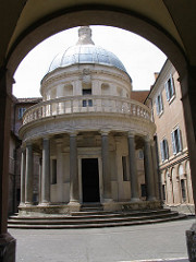 Bramante. Italian. Tempietto (at San Pietro in Montorio, Rome), 1502 High Renaissance -based on humanistic values on reviving the ancient Roman models, the building received its name because it appears to look like a little ancient temple -the round temples of ancient Rome directly inspired his design -Patrons: King Ferdinand and Queen Isabella of Spain -plan circular STYLOBATE (stepped temple platform) and an austere Tuscan style colonnade -Bramante achieved a wonderful balance and harmony in the relationship of the dome, drum and base, very unique, although resembles the Greek Tholos, it is different with the combination and new, (Classical Tholoi did not have a drum nor balustrade