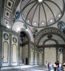 Brunelleschi, Pazzi Chapel, 1420-1460, 
-Brunelleschi wanted to return to the classical tradition of Ancient Rome by creating a centrally planned space with barrel vaulting, pendentives, and a hemispherical dome with an oculus to let light in. He also focused on the geometric elements of Ancient Roman art as many rectangular and circular structures are included. He uses Pietra serena,a grayish green tone to emphasize the decorative narratives on the walls. This return to classicism is influential in High Renaissance art, but was very unusual for the time period.The Pazzi chapel was a chapter house, so local monks met there.