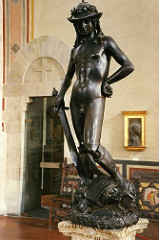 David by Donatello, 15th Cen. Italian Ren
- Bronze, commissioned by Medicis for palace 
- freestanding nude statue since classical era 
- forgetting some of realism, but more of symbol of florentine love of liberty - medici responsibility for freedom and prosperity, more political than biblical 
- opposing axes of intense and relaxed 
- 15th cen boots and hat, like god Mercury 
- hand on hip - very self-contented ooh - s-curve weight shift 
- high patina
- goliath = milan