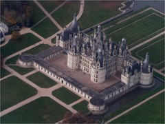 French Renaissance.Chateau de chambord. Domienico de Cotona. Frecn were not as concerned with symmetry as the Italians.