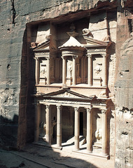Petra, Jordan: Treasury and Great Temple Nabateen Ptolemaic and Roman. c. 400 B.C.E - 100 C.E. Cut rock These elaborate carvings are merely a prelude to one's arrival into the heart of Petra, where the Treasury, or Khazneh, a monumental tomb, awaits to impress even the most jaded visitors. The natural, rich hues of Arabian light hit the remarkable façade, giving the Treasury its famed rose-red color.
