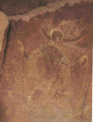 Running horned women Tassili n'Ajjer, Algeria. 6000-4000 B.C.E. Pigment on rock. The painting shows great contrast between the dark and light mediums used. There is also great detail put into the decorations of the woman. Most interestingly, though, there is a transparency to the larger woman and the figures behind her show through.