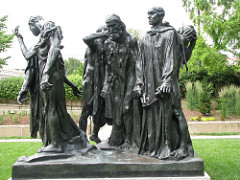 The Burghers of Calais Auguste Rodin. 1884-1895 C.E. Bronze He accomplished this by not only positioning each figure in a different stance with the men's heads facing separate directions, but he lowered them down to street level so a viewer could easily walk around the sculpture and see each man and each facial expression and feel as if they were a part of the group, personally experiencing the tragic event.