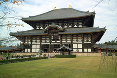Todai-ji Nara, Japan. Various artist, including sculptors Unkei and Keikei, as well as the Kei School. 743 C.E.; rebuilt c. 1700. Bronze and wood (sculpture); wood with ceramic-tile roofing (architecture) Todaiji represented the culmination of imperial Buddhist architecture. Todaiji is famous for housing Japan's largest Buddha statue. It housed the largest wooden building the world has yet seen. Even the 2/3 scale reconstruction, finished in the 17th century, it remains the largest wooden building on earth today.