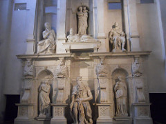 Tomb of Julius II by Michelangelo, High Ren
- originally 2 stories w/28 statues, freestanding, ended up smaller and less statues, close off w/volutes 
- some meant to be seen from below, but not so impactful 
Moses: Leader of Israle, hand grips beard, left leg back as if to stand, give laws, ready to exert energy to throw down laws, awesome power. Deeply undercut, shadow plays, surface patina